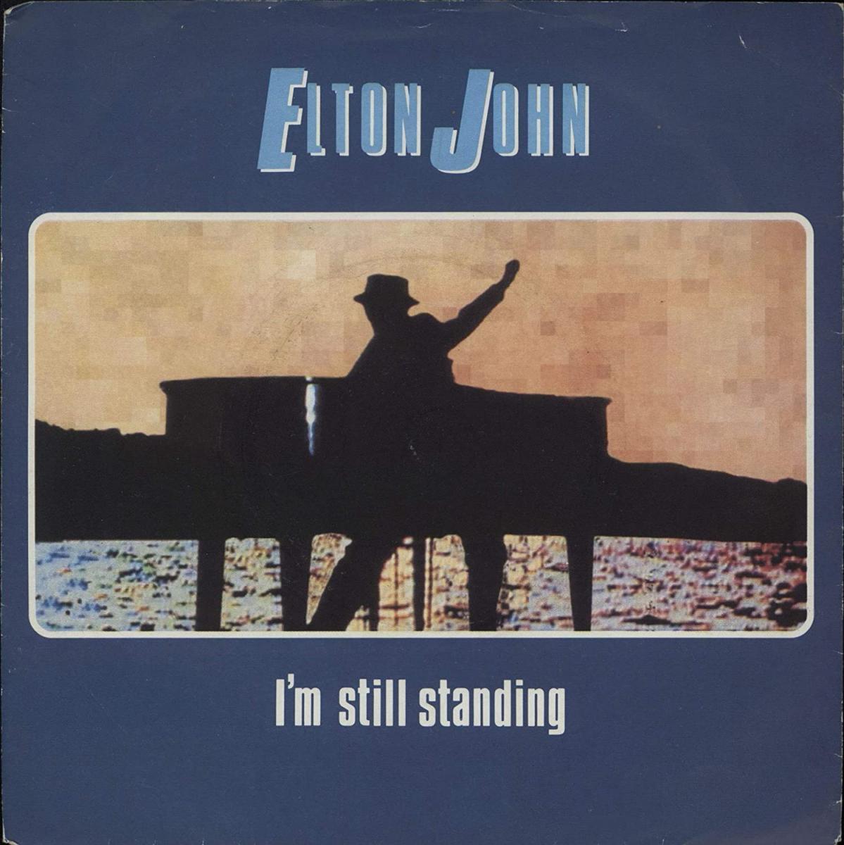 Песня im still. I'M still standing. Elton John i'm still standing. Элтон Джон still standing. I'M still standing Elton John обложка.