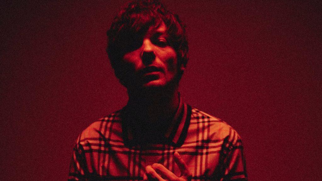 Louis Tomlinson Shares Gritty New Track “Out Of My System